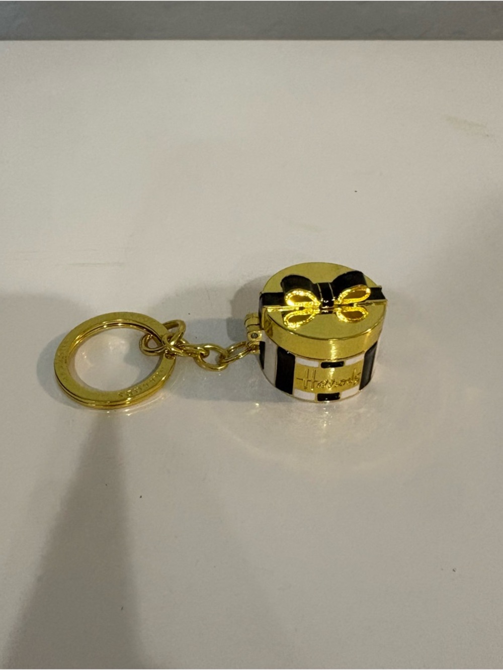 Harrod's London black and white striped bow pill box keychain bag charm